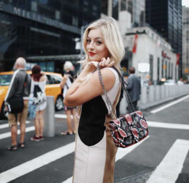 influencer crossing the street with handbag