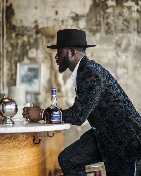 influencer sitting at a bar
