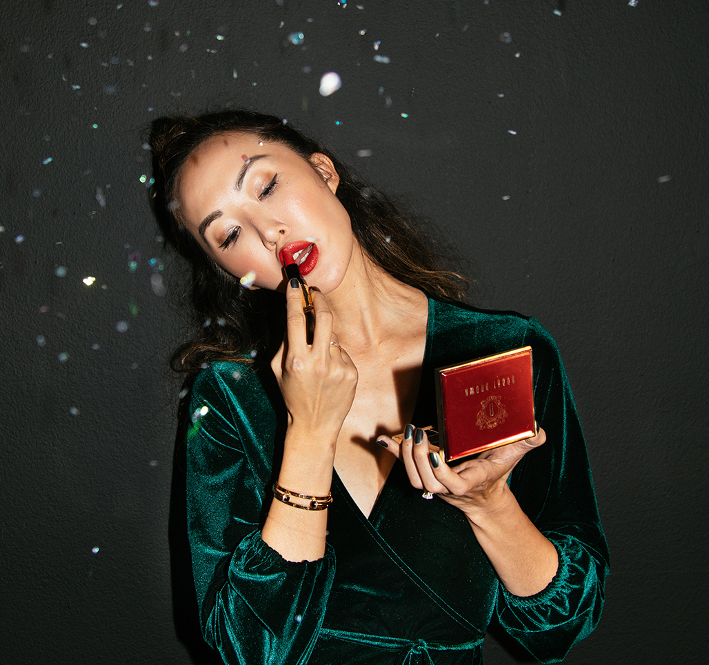 Chriselle Lim applying Bobbi Brown makeup for a social media post